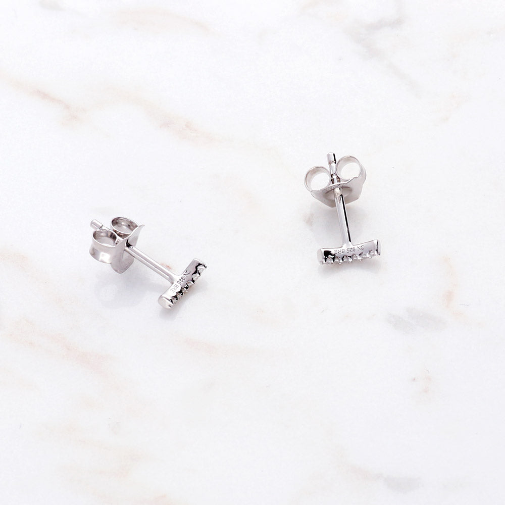Flatlay view of Bar CZ Stud Earrings in Sterling Silver, Yellow Gold Flashed