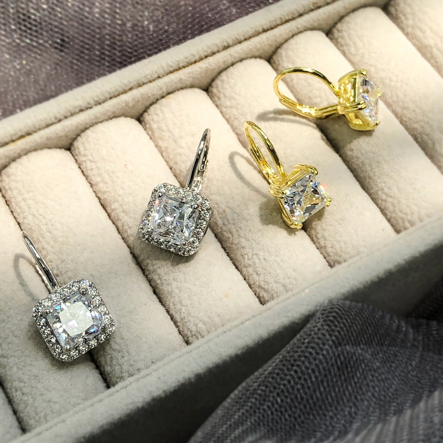 Flatlay view of Solitaire 4ct Princess CZ Leverback Earrings in Sterling Silver, Gold Flashed