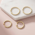 Angle view of CZ Small Hoop Earrings in Sterling Silver, 0.9 inch, Gold Flashed