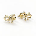 Angle view of Bow Tie Ribbon CZ Stud Earrings in Gold Flashed Sterling Silver, Gold Flashed, CZ