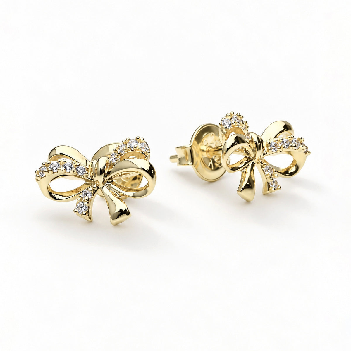 Angle view of Bow Tie Ribbon CZ Stud Earrings in Gold Flashed Sterling Silver, Gold Flashed, CZ