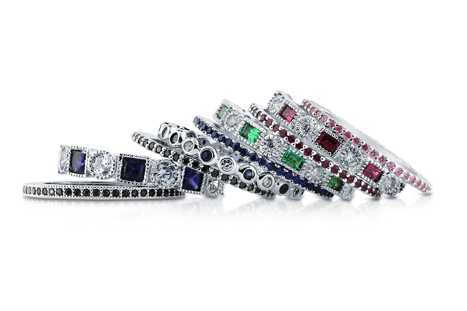 Simulated emerald, sapphire and ruby eternity rings