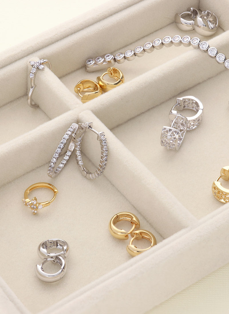 Shop gold hoops and shop silver hoops