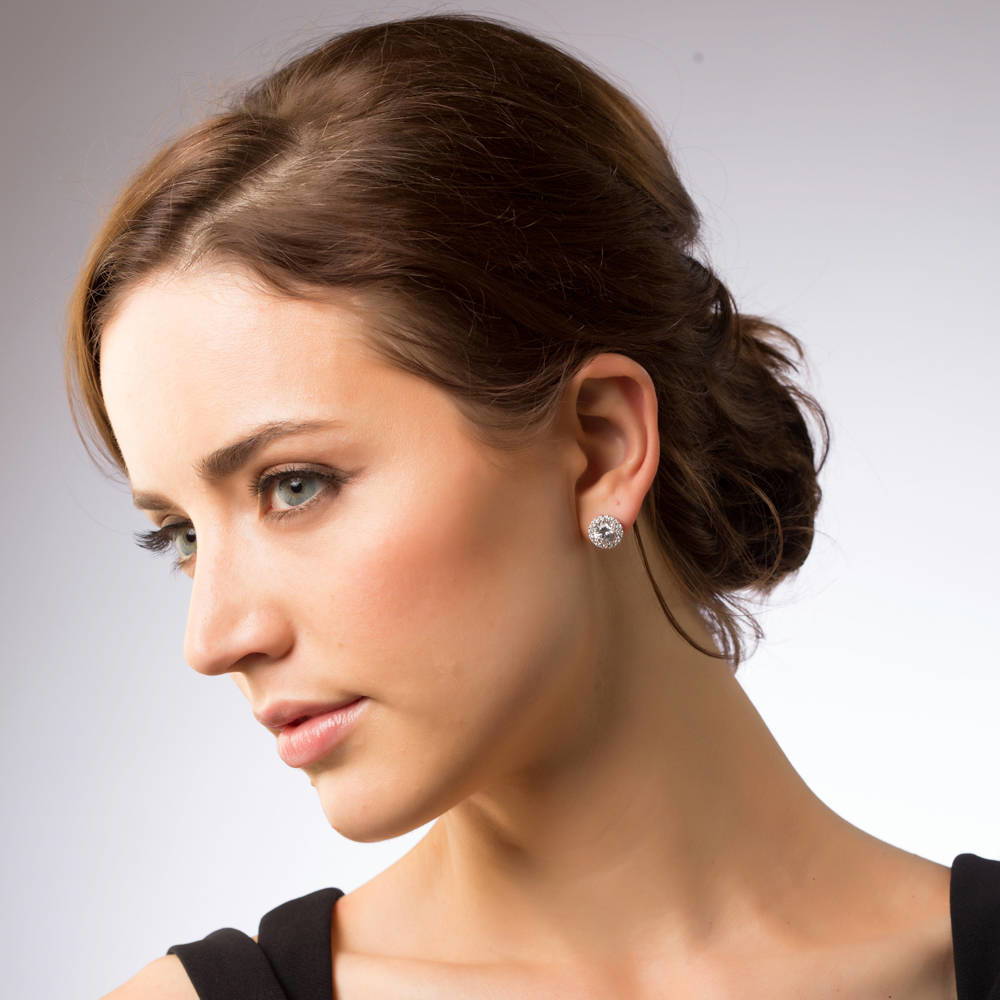 Model wearing Halo CZ Stud Earrings in Sterling Silver, 4 of 5