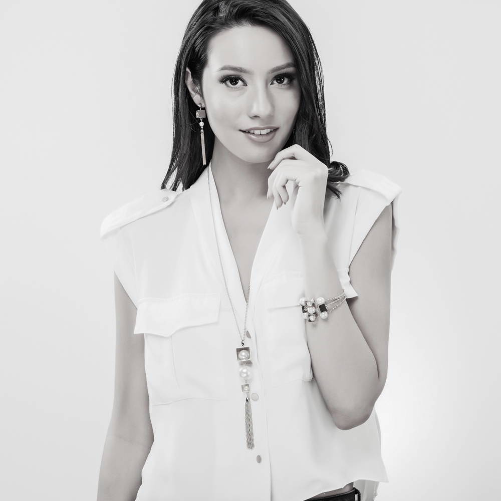 Model wearing Imitation Pearl Chain Bracelet, Rose Gold-Tone