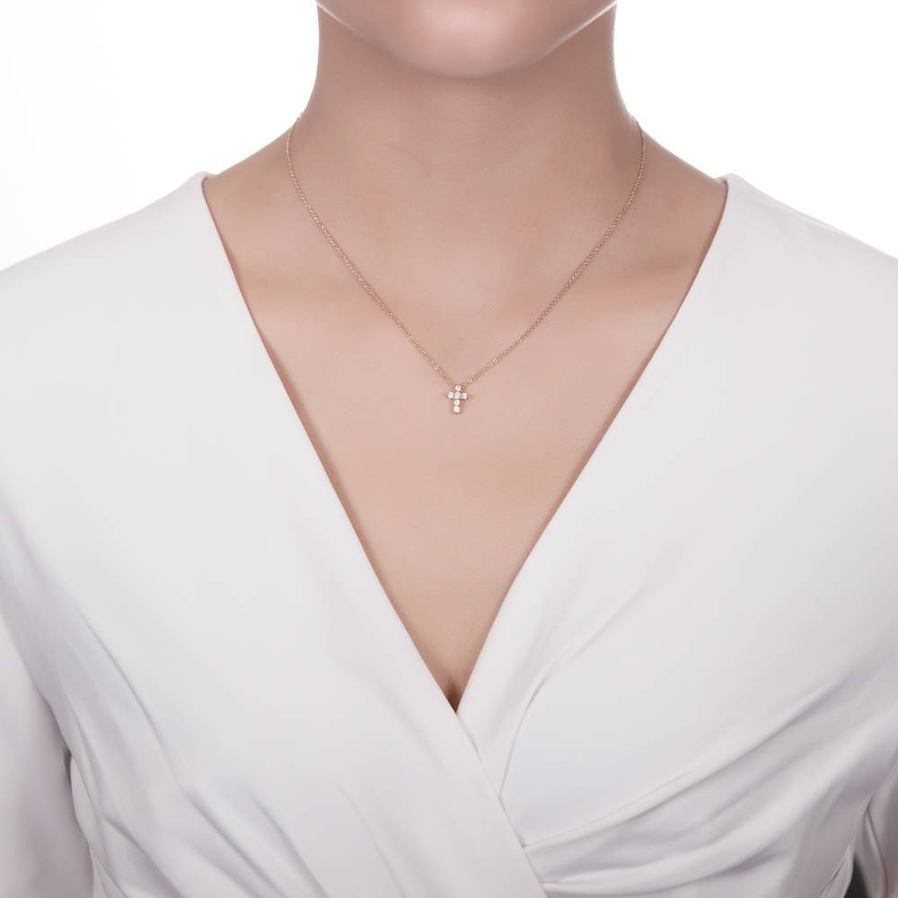 Model wearing Cross CZ Pendant Necklace in Sterling Silver, Yellow Gold Flashed