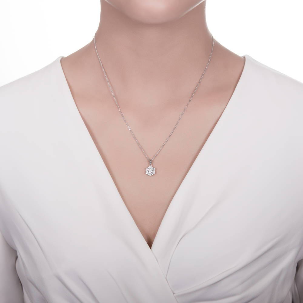 Model wearing Flower Halo CZ Necklace and Earrings in Sterling Silver, 13 of 16
