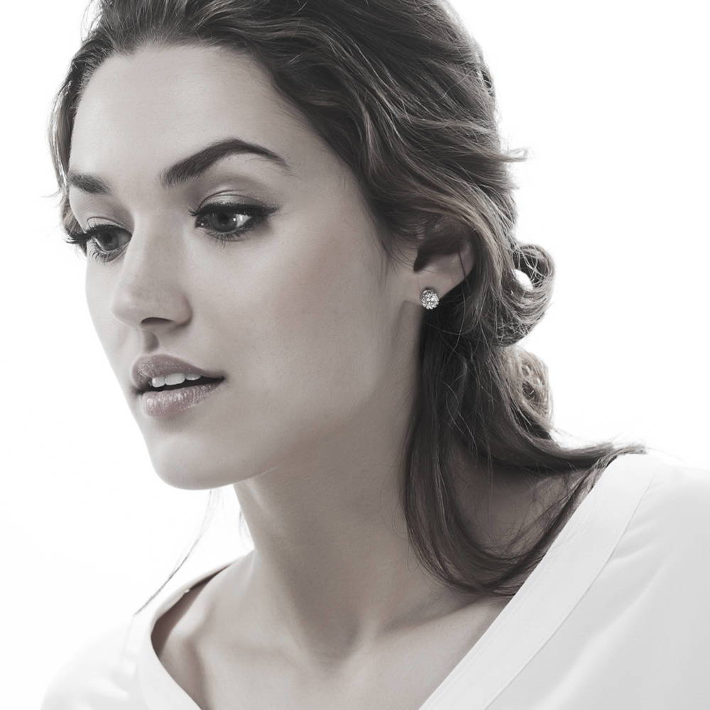 Model wearing Solitaire 1.6ct Crown Set CZ Stud Earrings in Sterling Silver, Rose Gold Flashed