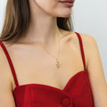 Model wearing Snake CZ Necklace and Earrings in Sterling Silver, Gold Flashed