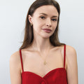 Model wearing Snake CZ Necklace and Earrings in Sterling Silver, Gold Flashed