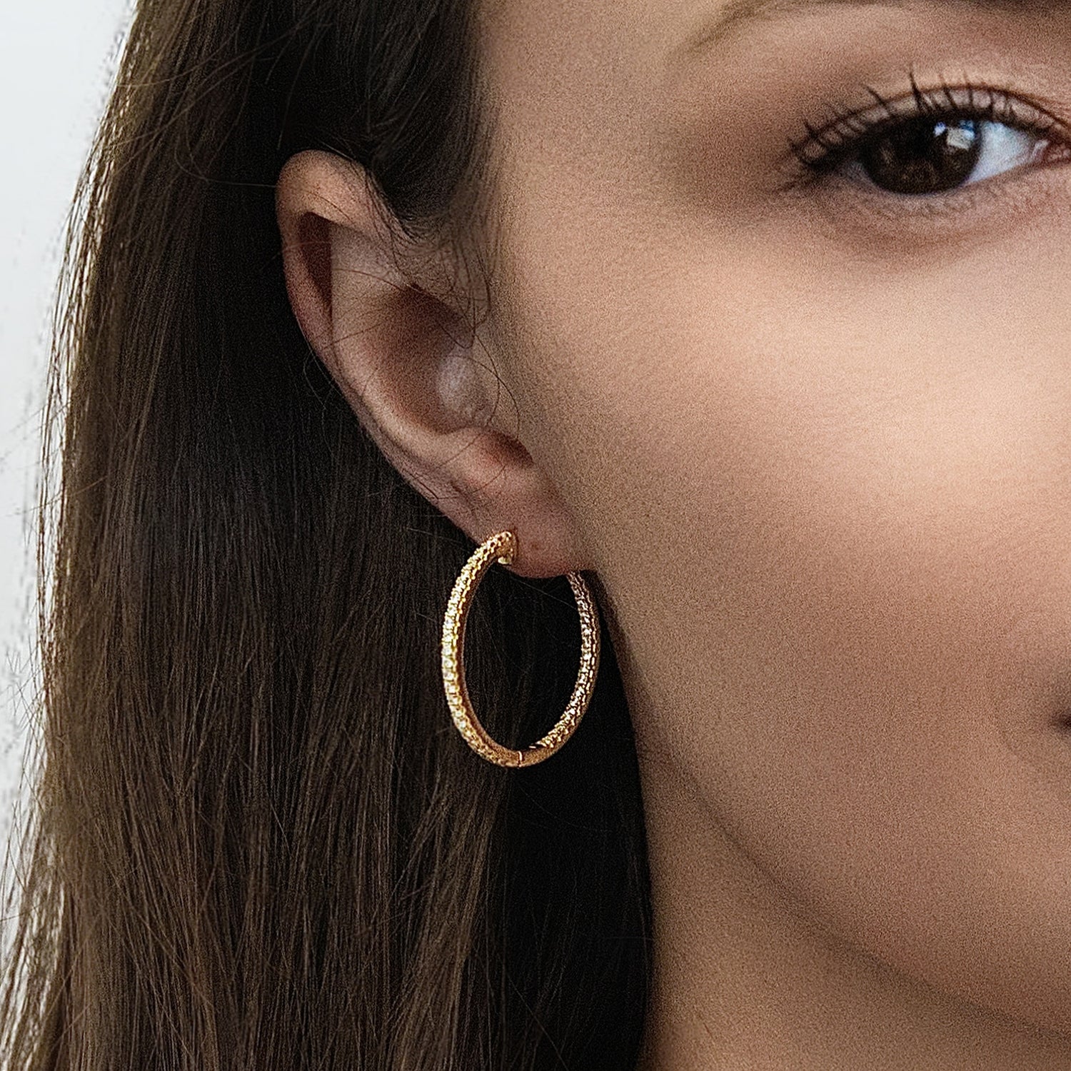 Model wearing CZ Small Hoop Earrings in Sterling Silver, 1 inch, Gold Flashed