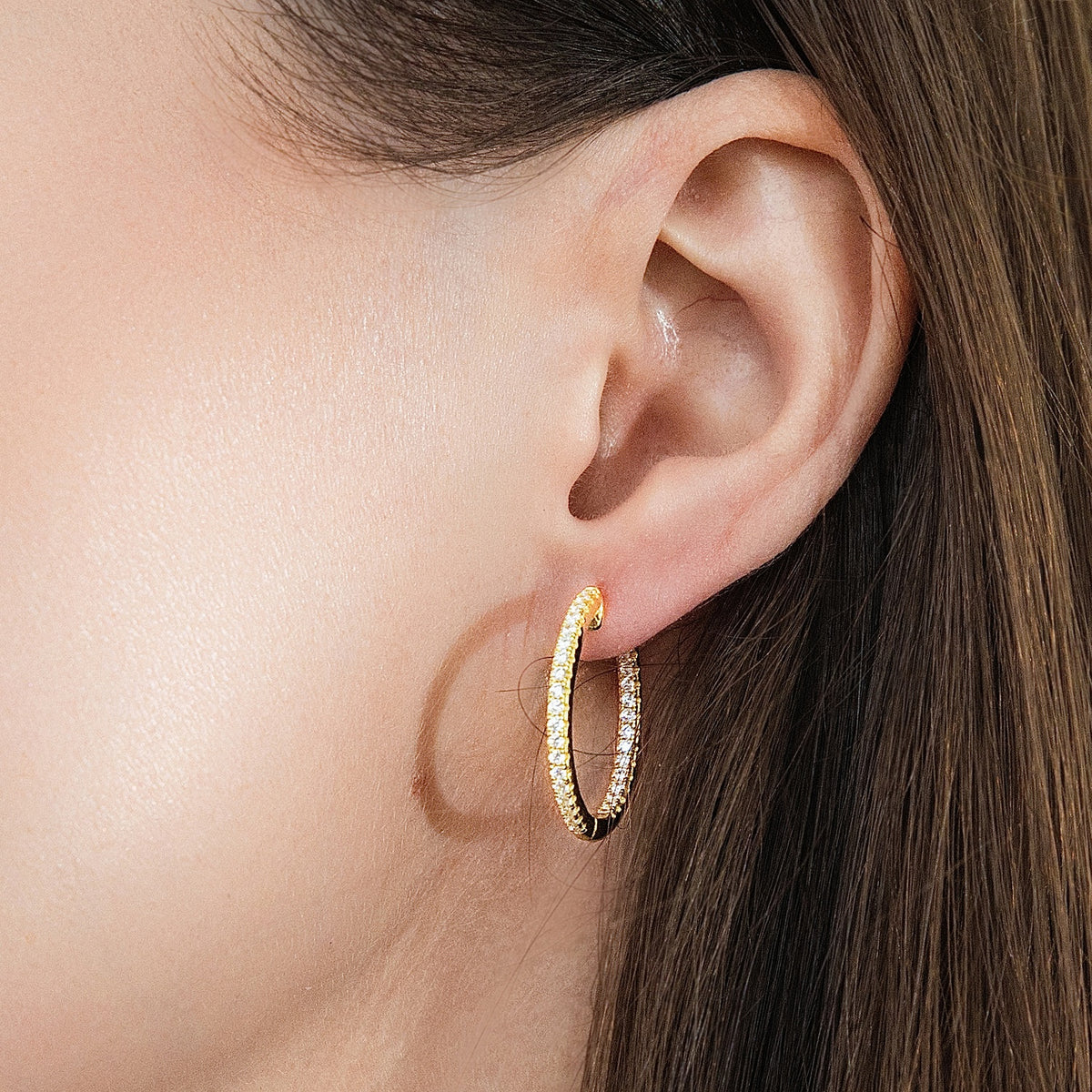 Model wearing CZ Small Hoop Earrings in Sterling Silver, 0.9 inch, Gold Flashed