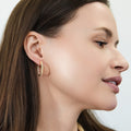 Model wearing CZ Small Hoop Earrings in Sterling Silver, 0.9 inch, Gold Flashed