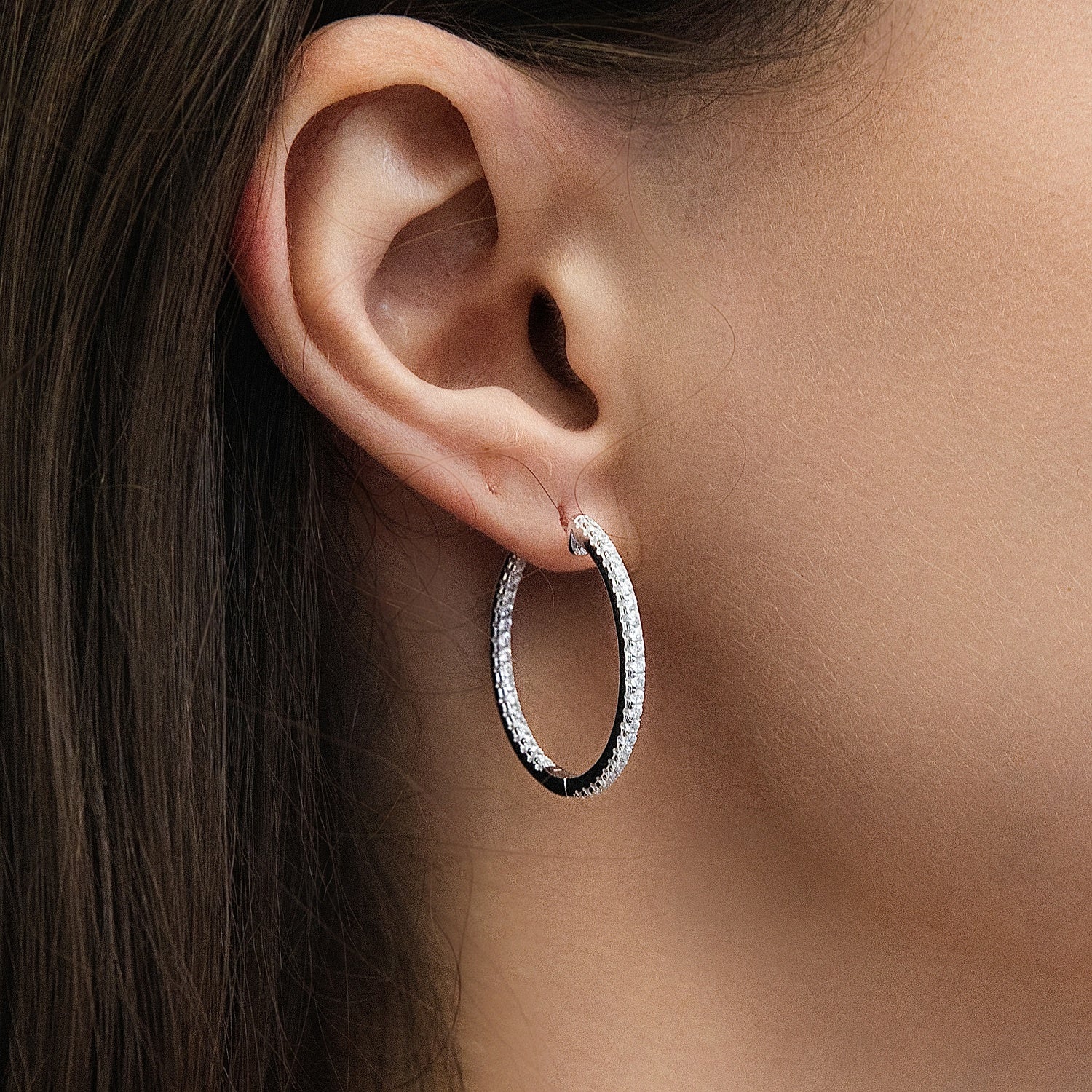 Model wearing CZ Small Hoop Earrings in Sterling Silver, 1 inch