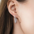 Model wearing CZ Small Hoop Earrings in Sterling Silver, 0.9 inch