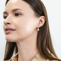 Model wearing Solitaire Emerald Cut CZ Leverback Earrings in Sterling Silver, Gold Flashed