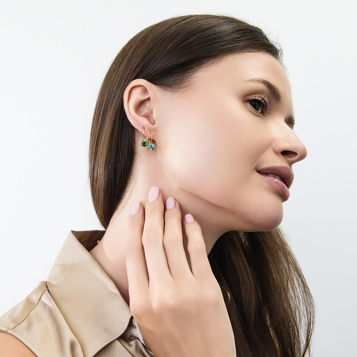 Model wearing Solitaire 1.2ct Bezel CZ Leverback Earrings in Sterling Silver, Green, Gold Flashed