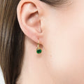 Model wearing Solitaire 1.2ct Bezel CZ Leverback Earrings in Sterling Silver, Green, Gold Flashed
