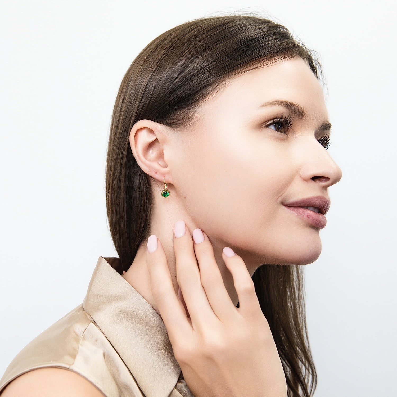 Model wearing Solitaire 1.2ct Bezel CZ Leverback Earrings in Sterling Silver, Green, Gold Flashed