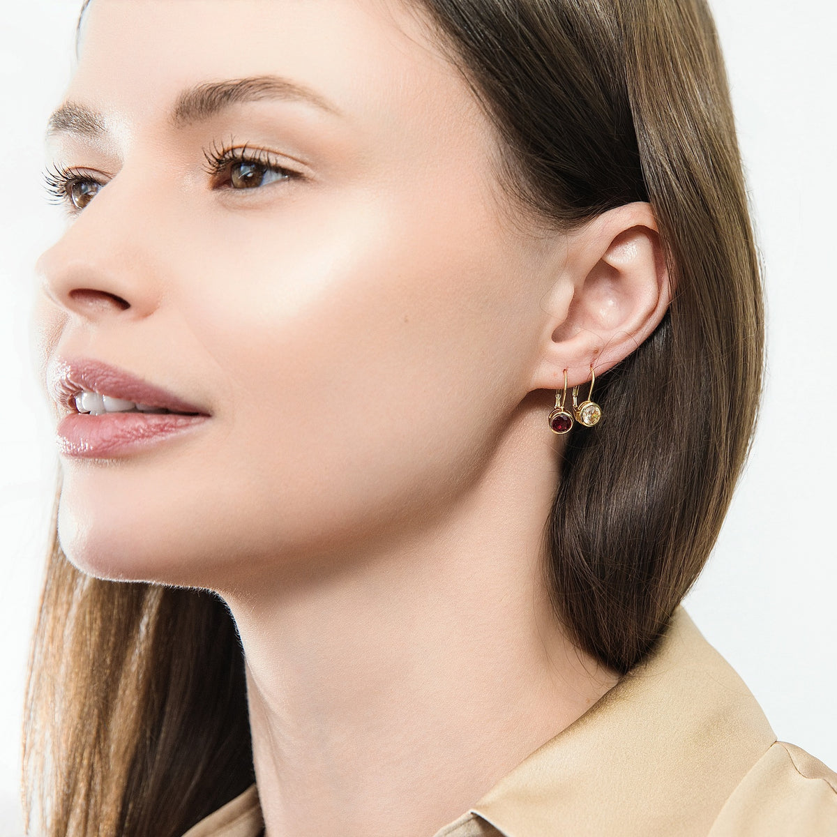 Model wearing Solitaire 1.2ct Bezel CZ Leverback Earrings in Sterling Silver, Champagne, Gold Flashed