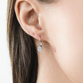 Model wearing Solitaire Oval Oval CZ Leverback Earrings in Sterling Silver, Rhodium Plated
