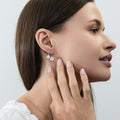 Model wearing Solitaire 4ct Cushion CZ Leverback Earrings in Sterling Silver, Rhodium Plated