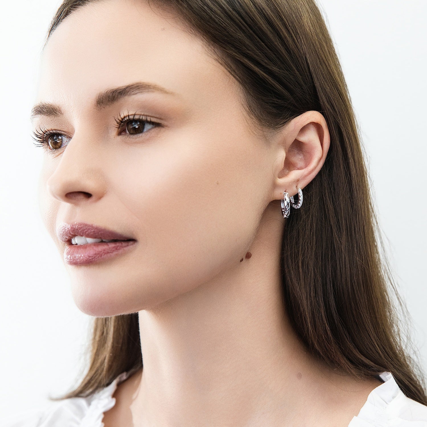 Model wearing Woven Small Hoop Earrings in Sterling Silver 0.6 inch, 4 of 4