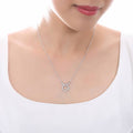 Model wearing Zodiac Sign CZ Necklace in Sterling Silver, Aries