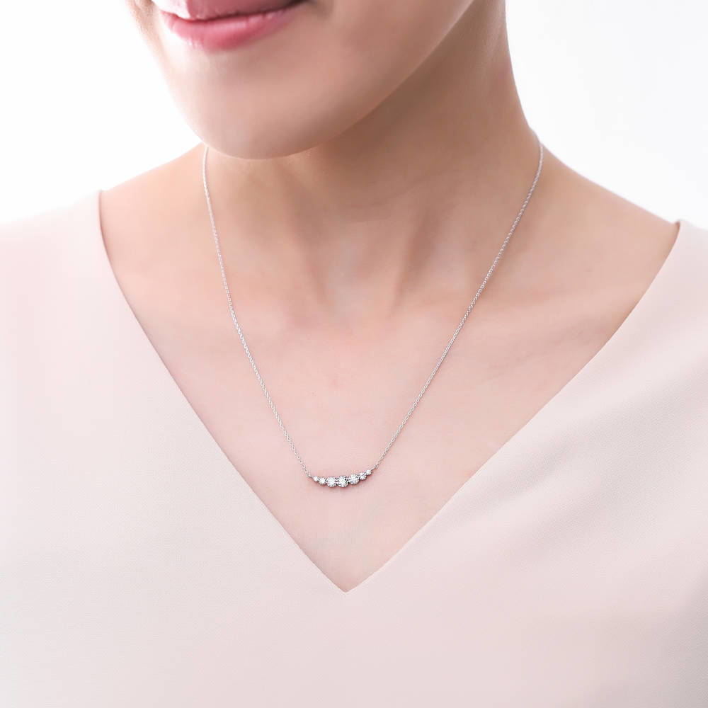 Model wearing Graduated Bubble Bar CZ Necklace in Sterling Silver, Rhodium Plated