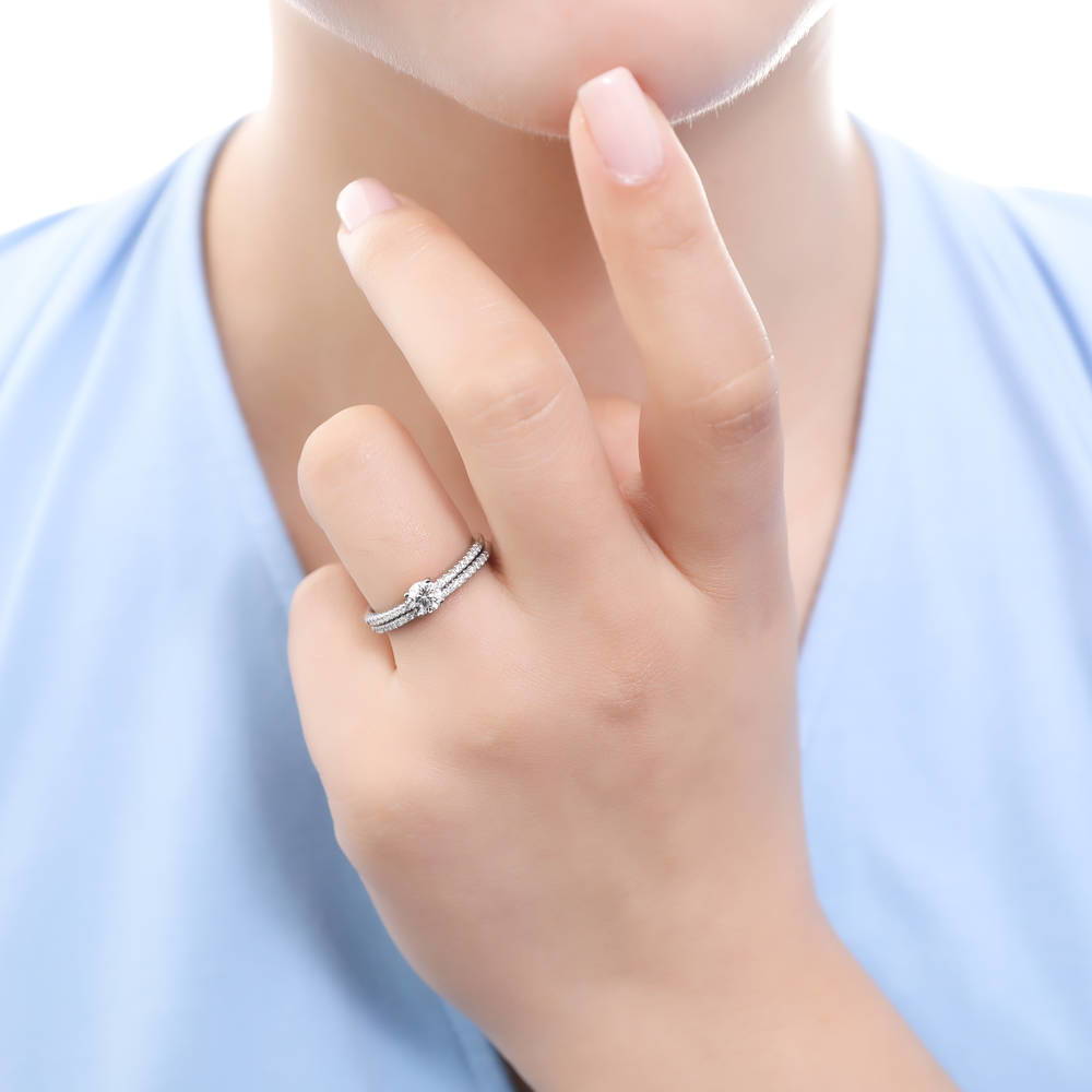 Model wearing Pave CZ Eternity Ring in Sterling Silver, 12 of 18