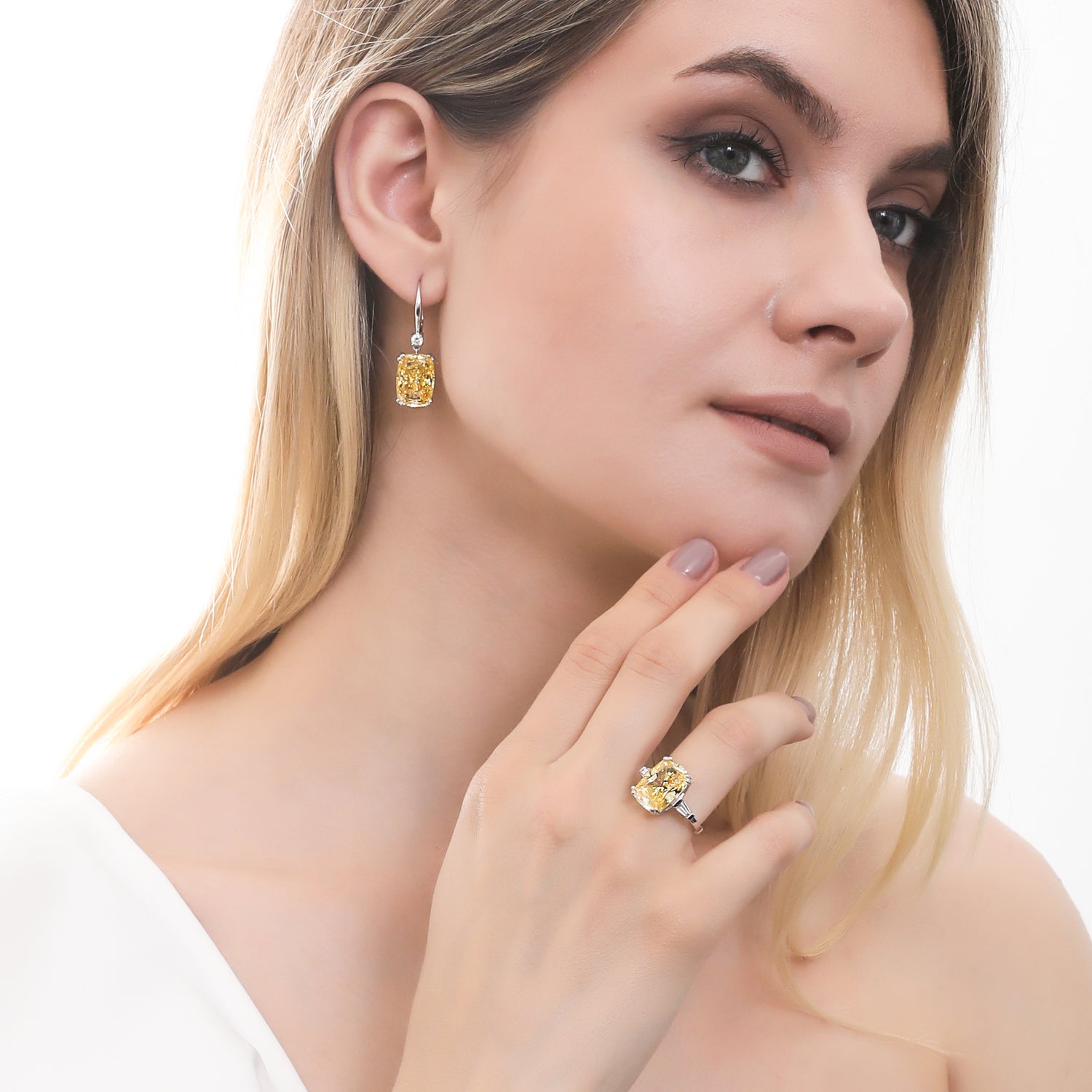Model wearing Solitaire Canary Yellow CZ Leverback Earrings in Sterling Silver, 6 of 6