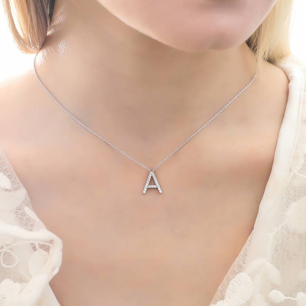 Model wearing Initial Letter CZ Necklace in Sterling Silver, A