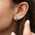 Model wearing Solitaire 1.6ct CZ Cartilage Stud Earrings in Sterling Silver