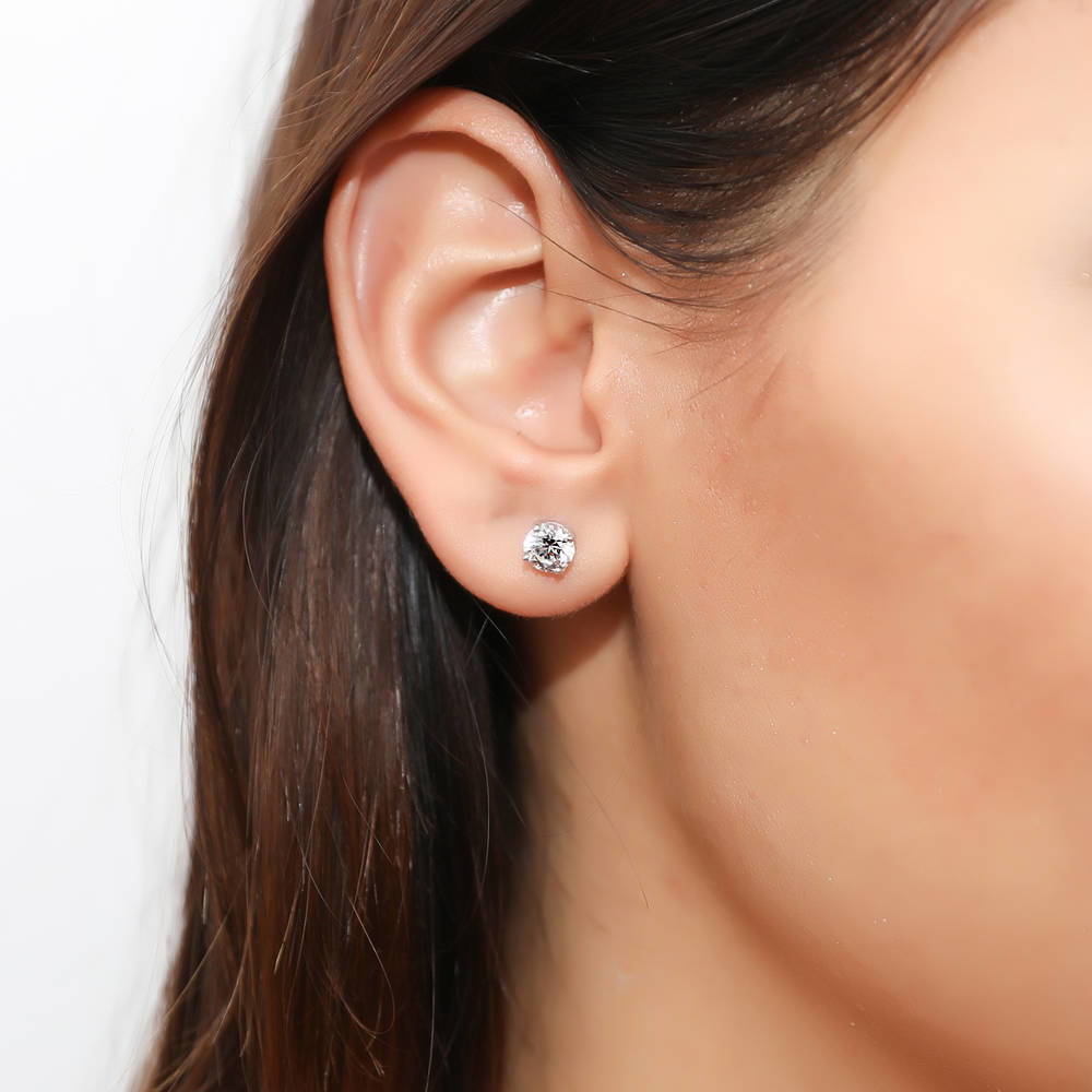 Model wearing Solitaire 1.6ct CZ Cartilage Stud Earrings in Sterling Silver