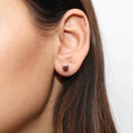 Model wearing Solitaire 1.6ct CZ Stud Earrings in Sterling Silver, Rhodium Plated / Caramel