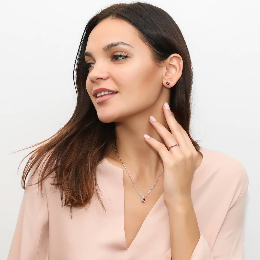 Model Wearing Eternity Ring, Solitaire Pendant Necklace, Solitaire Stud Earrings
