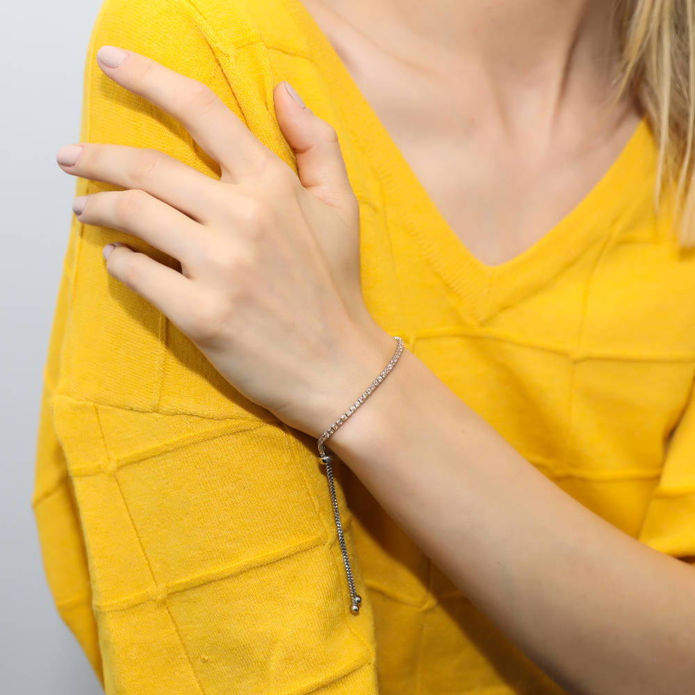Model wearing CZ Tennis Bracelet Gold Flashed, Champagne Color