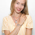 Model wearing Heart CZ Toggle Necklace, Silver-Tone / 18 Inch