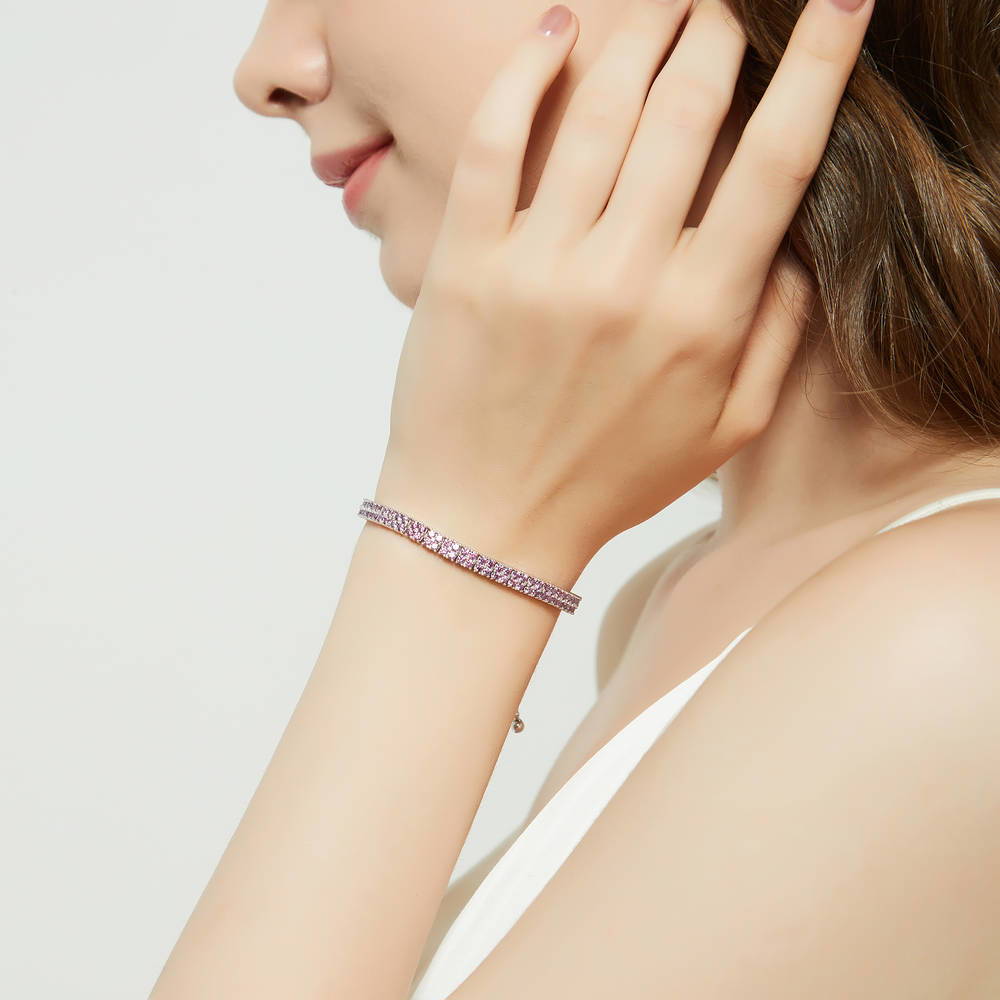 Model wearing Bar CZ Tennis Bracelet in Sterling Silver, Purple Color