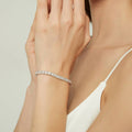 Model wearing Bar CZ Tennis Bracelet in Sterling Silver 4-9 inch, Clear Color