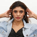 Model wearing CZ Inside-Out Hoop Earrings in Sterling Silver 1.8 inch, Rose Gold Flashed