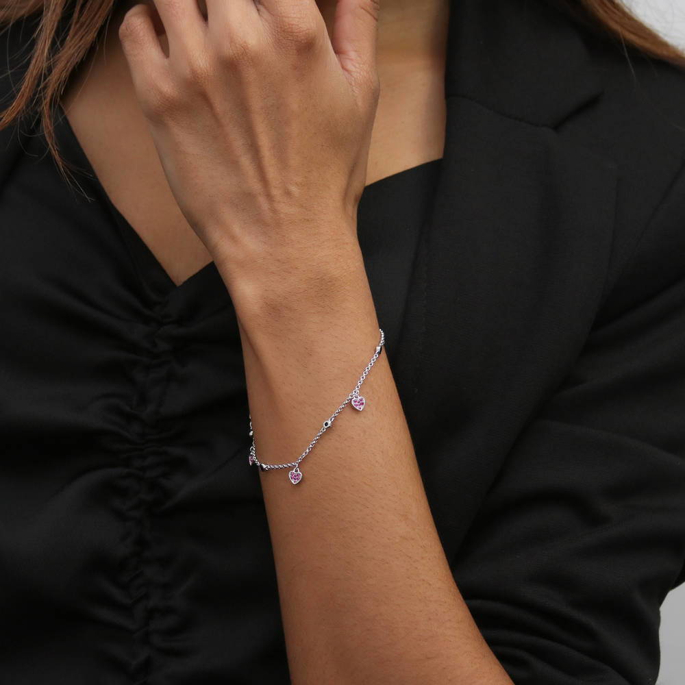 Model wearing Heart CZ Station Bracelet in Sterling Silver, Black