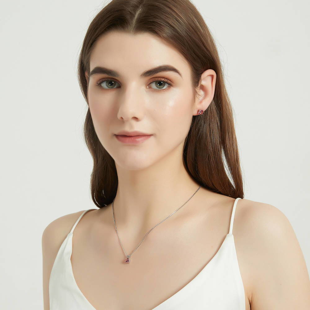 Model wearing Kaleidoscope Solitaire 0.8ct CZ Necklace in Sterling Silver, Red Orange Color