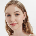 Model wearing Solitaire CZ Leverback Earrings in Sterling Silver, 6mm