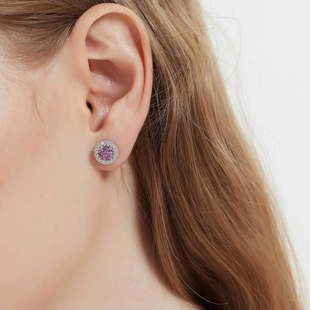 Model wearing Halo Kaleidoscope CZ Stud Earrings in Sterling Silver, Purple Color