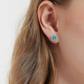 Model wearing Halo Kaleidoscope CZ Stud Earrings in Sterling Silver, Caramel Color
