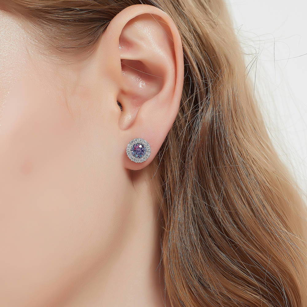 Model wearing Halo Kaleidoscope CZ Stud Earrings in Sterling Silver, Purple Aqua Color