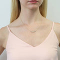 Model wearing Bubble CZ Pendant Necklace in Sterling Silver, Yellow Gold Flashed