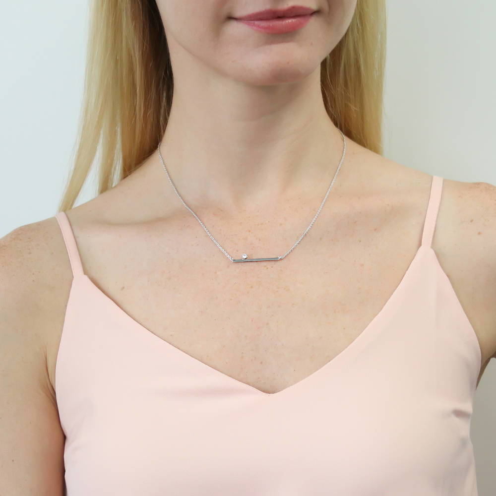 Model wearing Bar CZ Pendant Necklace in Sterling Silver, Yellow Gold Flashed