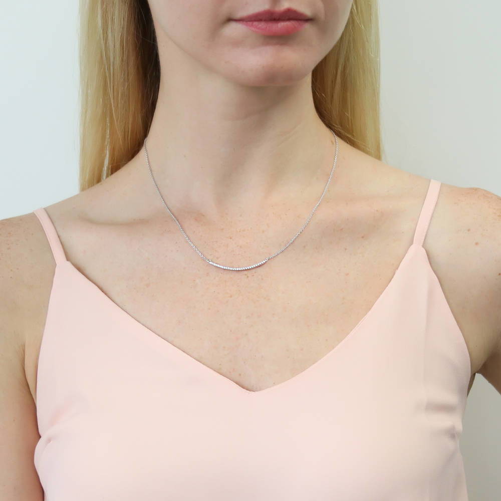 Model wearing Bar CZ Pendant Necklace in Sterling Silver, Yellow Gold Flashed